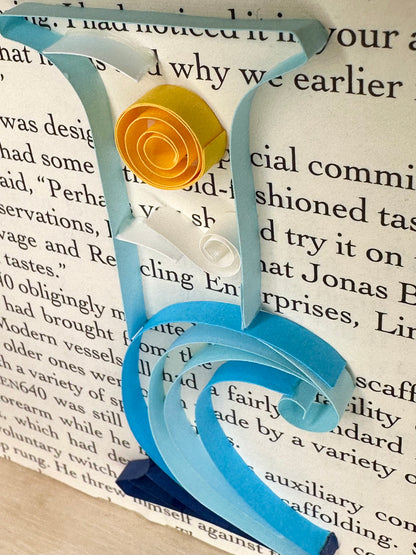 Close up waves and sun quilling art