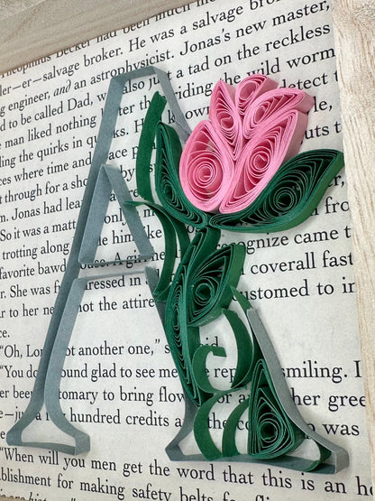 Photo of a quilling piece with a letter A