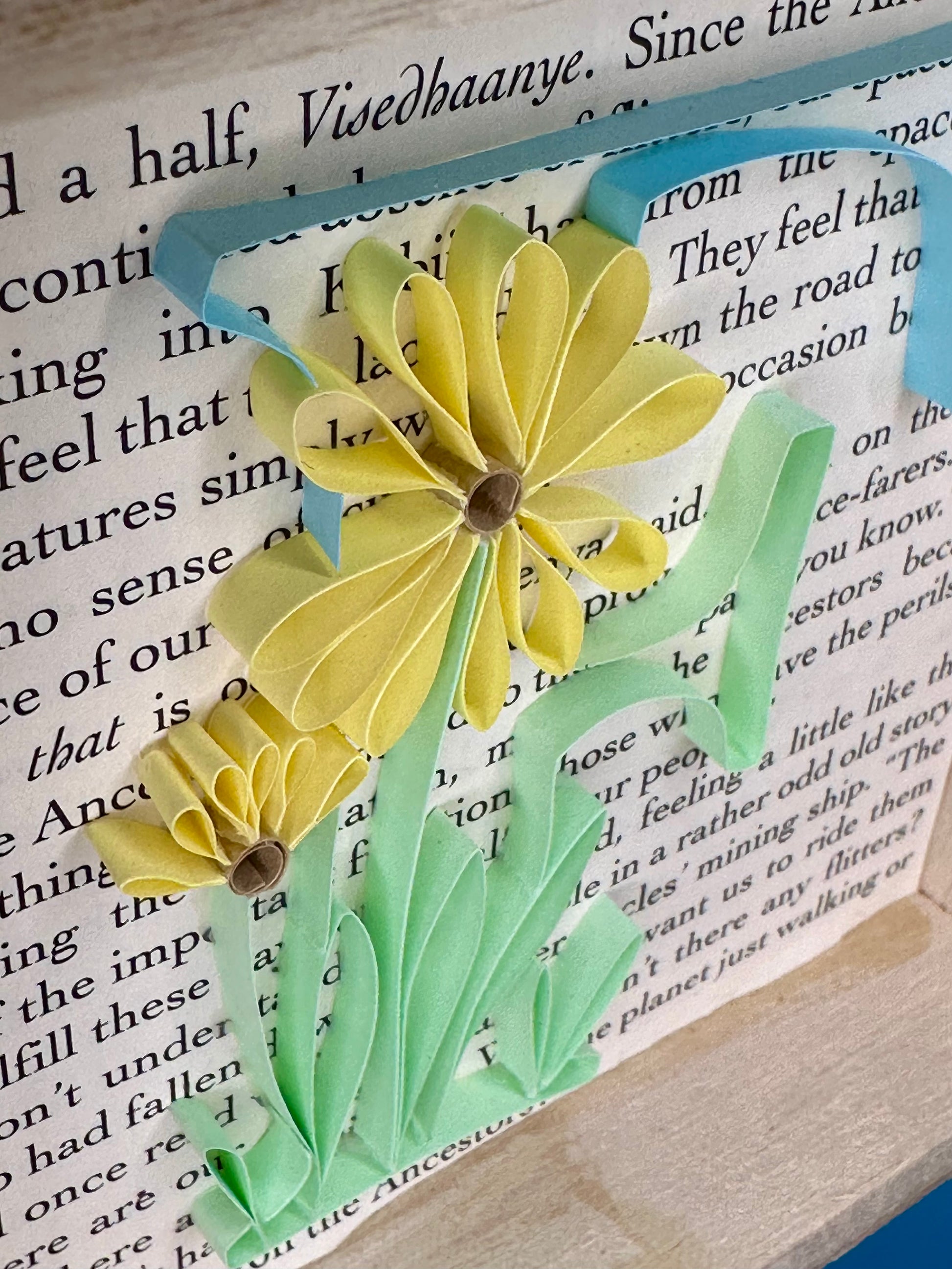 Floral art with paper quilling