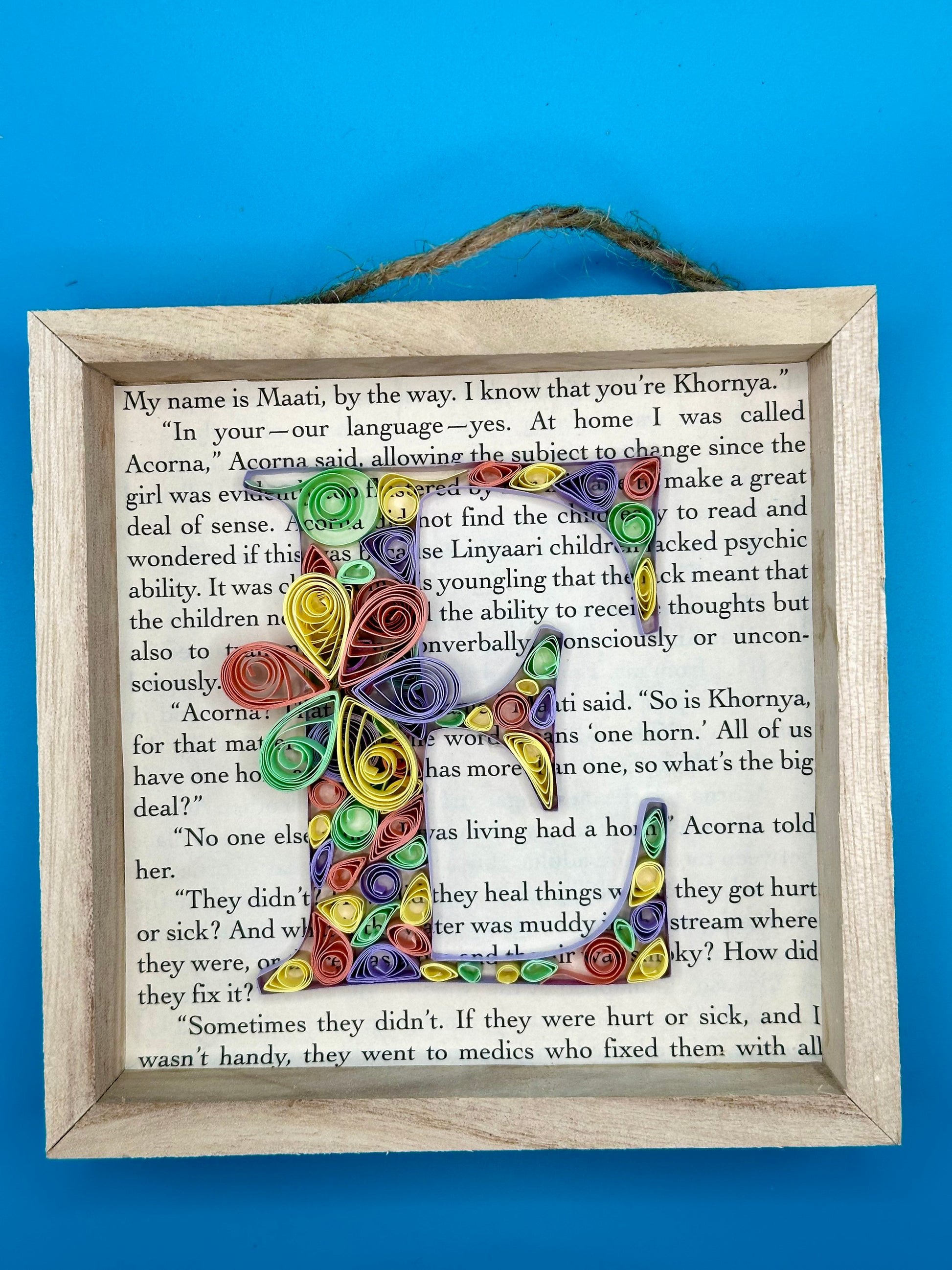 Shadow box with quilling letter E