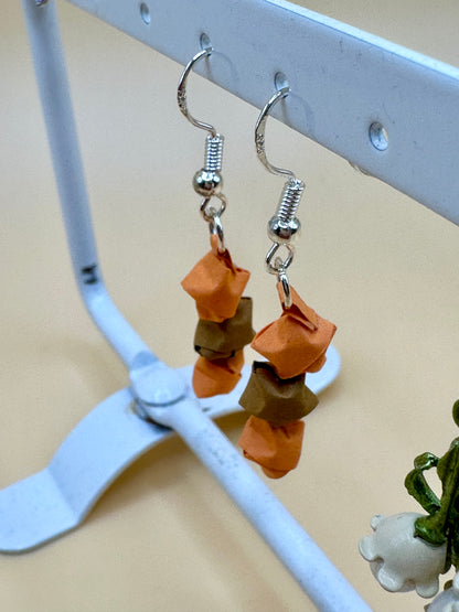 Orange star earrings quilling